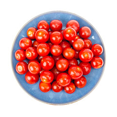 Vegetables. Small red cherry tomatoes isolated on white
