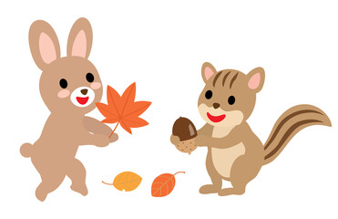 秋の収穫に喜ぶ可愛い動物ウサギとリス