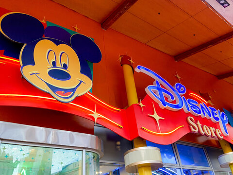 Disney store sign logo with mickey mouse in french disneyland us shop