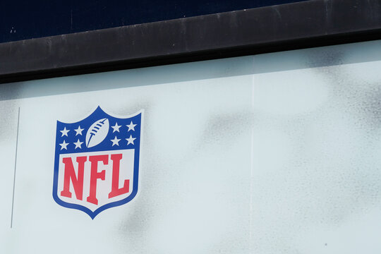 NFL logo sign on windows of sporty store of american football