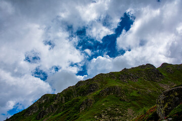 rocks clouds and blue sky