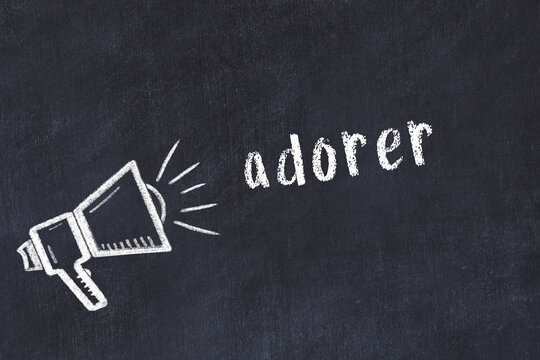 Chalk sketch of loudspeaker and inscription adorer