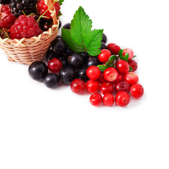 Berries  in a basket isolated on a white background.