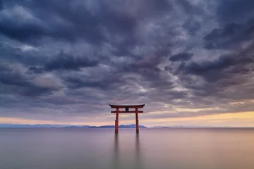 Foto op Canvas Long exposure shot of Shirahige shrine Torii gate at sunset at Lake Biwa, Shiga Prefecture, Japan © discoverjapan
