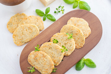 home made cheese crackers with herbs on a table