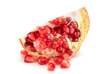 Fresh peeled pomegranate on white background