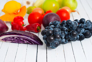 fruits and vegetables on white wood table