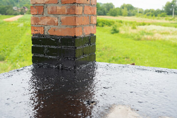 the terrace is covered with a layer of waterproofing mastic