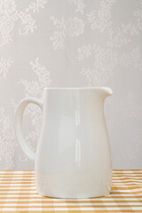 milk jug on wooden table