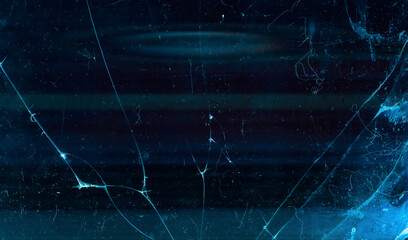 Broken glass overlay. Fractured screen. Blue purple aged stained laptop display with dust scratches.