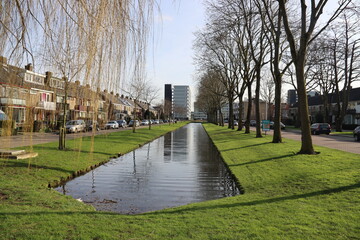 Water in a canal on the Singel in the village of Nieuwerkerk aan den IJssel on a sunny day.