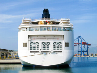 Modern cruiseship or cruise ship liner in port of Malaga, Spain during Mediterranean cruising in...