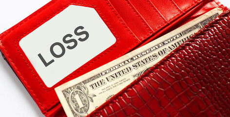 Words text LOSS on business card, and red leather wallet. Financial,business concept