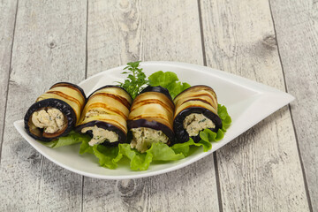 Stuffed eggplant roll with cheese and herbs