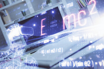Desktop computer background and formula hologram writing. Double exposure. Education concept.