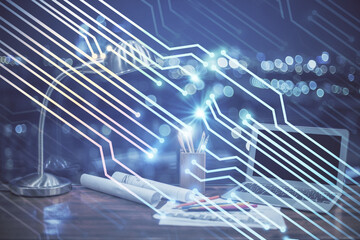 Double exposure of computer and technology theme hologram. Concept of freelance work.