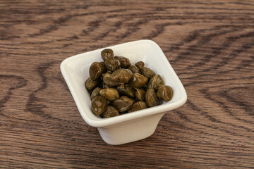 Tasty capers in the bowl
