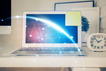Computer on desktop with social network theme icon. Multi exposure. Concept of international connections.