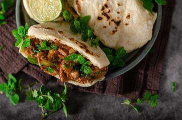Homemade pita bread with meat and herbs