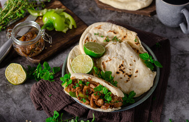Homemade pita bread with meat and herbs