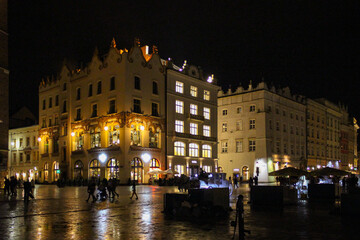 Fototapeta premium Krakow, Poland - July 03, 2016: View Of The Main Square And Krakow Cloth Hall In The Night