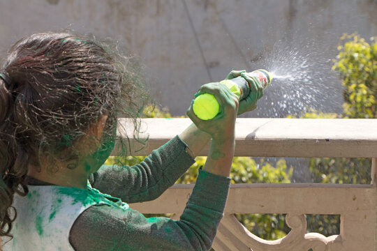 Girls playing with colors on ocassion of Holi festival