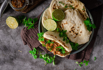 Homemade pita bread with meat and herbs