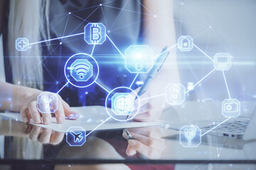 Social network theme hologram over hands taking notes background. Concept of global international people connect. Double exposure