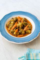 Turkish Style Healthy Organic Vegan Vegetarian Hot Brussel Sprouts Food with Carrots and Tomato Paste.