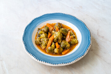 Turkish Style Healthy Organic Vegan Vegetarian Hot Brussel Sprouts Food with Carrots and Tomato Paste.