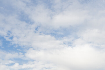 white fluffy clouds in the blue sky, Blue sky background with tiny clouds