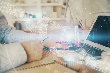 Businessman working on Laptop with technology theme drawing. Concept of big data. Double exposure.