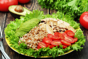 Turkey breast, avocado, salad and buckwheat as healthy lunch