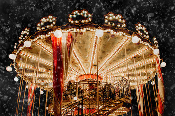 Carousel on Christmas Fair in night illumination