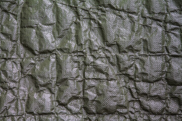 Texture of a brown tarpaulin.