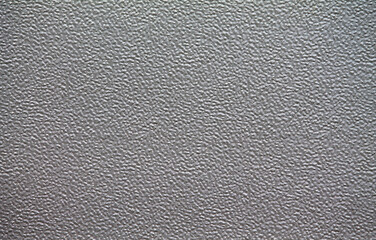 Texture of an aluminum roller shutter in a factory building.