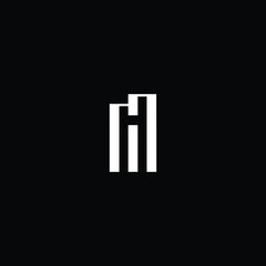 Minimal elegant monogram art logo. Outstanding professional trendy awesome artistic MH HM initial based Alphabet icon logo. Premium Business logo white color on black background