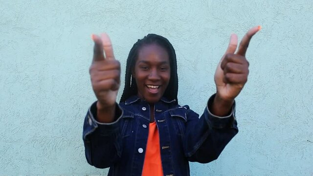 Happy African American Shows Off You