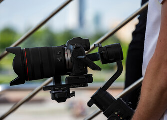 the photographer at work is preparing to shoot