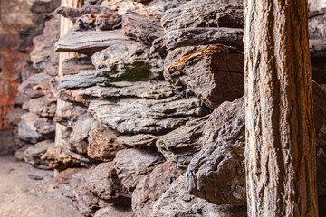 Dry charcoal pile stacked in basement