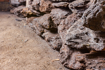 Dry charcoal pile stacked in basement