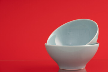 Blue Ceramic bowl on color backgrounds,
