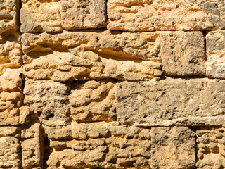Abstract old stone wall with cracks and scratches. Landscape style. Great background or texture.