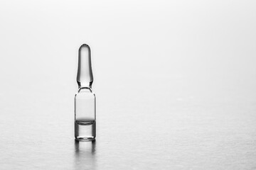 Medical glass ampules on white background  with copy space