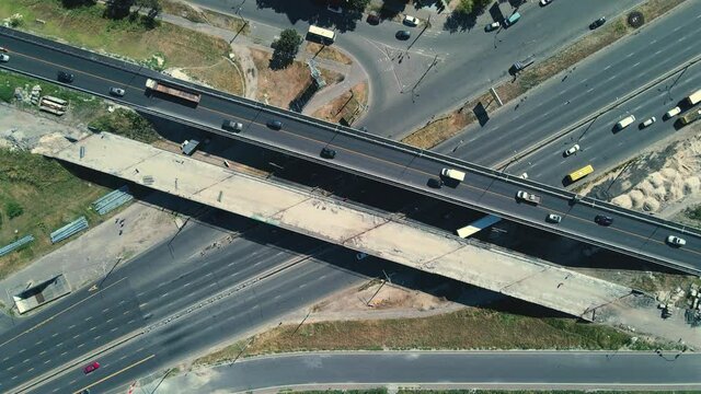 UKRAINE, KYIV - JULE 09, 2020: Aerial shot of highway reconstruction on Stepan Bandera Avenue in Kyiv. Bridge construction near the Pochayna metro station 