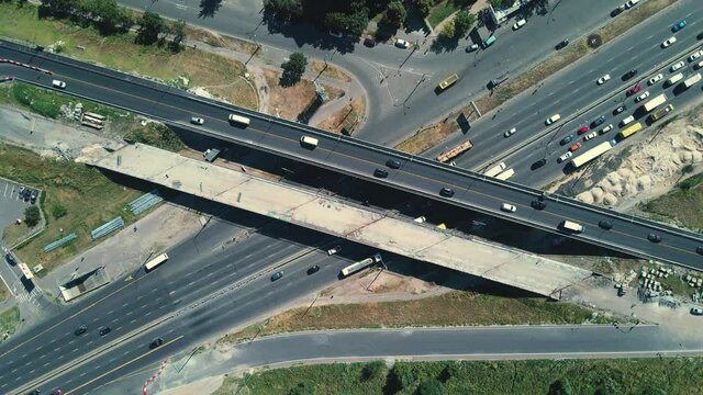 UKRAINE, KYIV - JULE 09, 2020: Aerial shot of highway reconstruction on Stepan Bandera Avenue in Kyiv. Bridge construction near the Pochayna metro station 