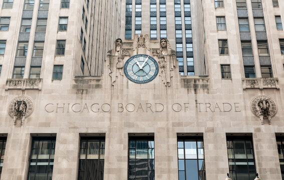 Chicago, Illinois, USA - August 23, 2014: Facade of Board of Trade Building with a clock along LaSalle street in Chicago.