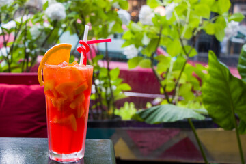Alcoholic cocktail and lemonade with citruses