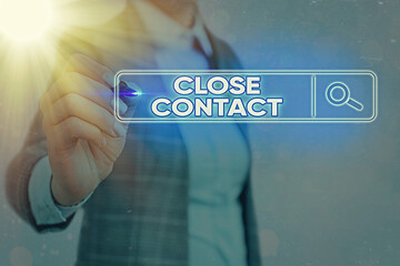 Writing note showing Close Contact. Business concept for having a history of direct exposure to a...