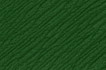 Green polyester textured fabric closeup background